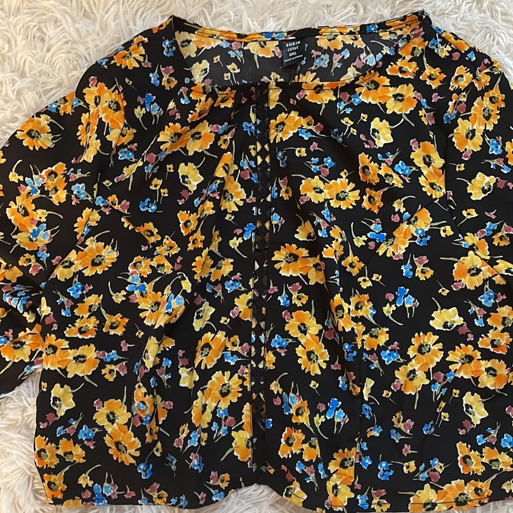 The shirt did not fit so I am selling. It has never been worn!